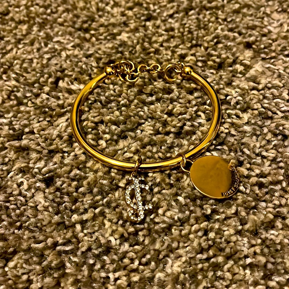 Juicy Couture Gold Bangle with 2 charms.